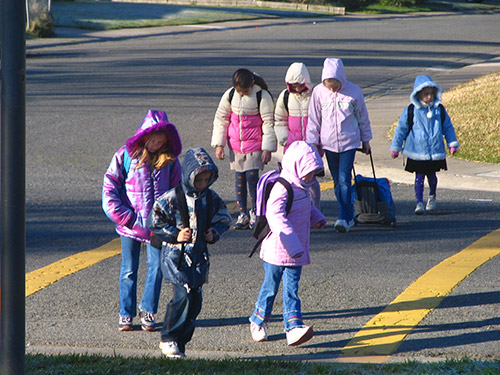 Children crossing at a crosswalk